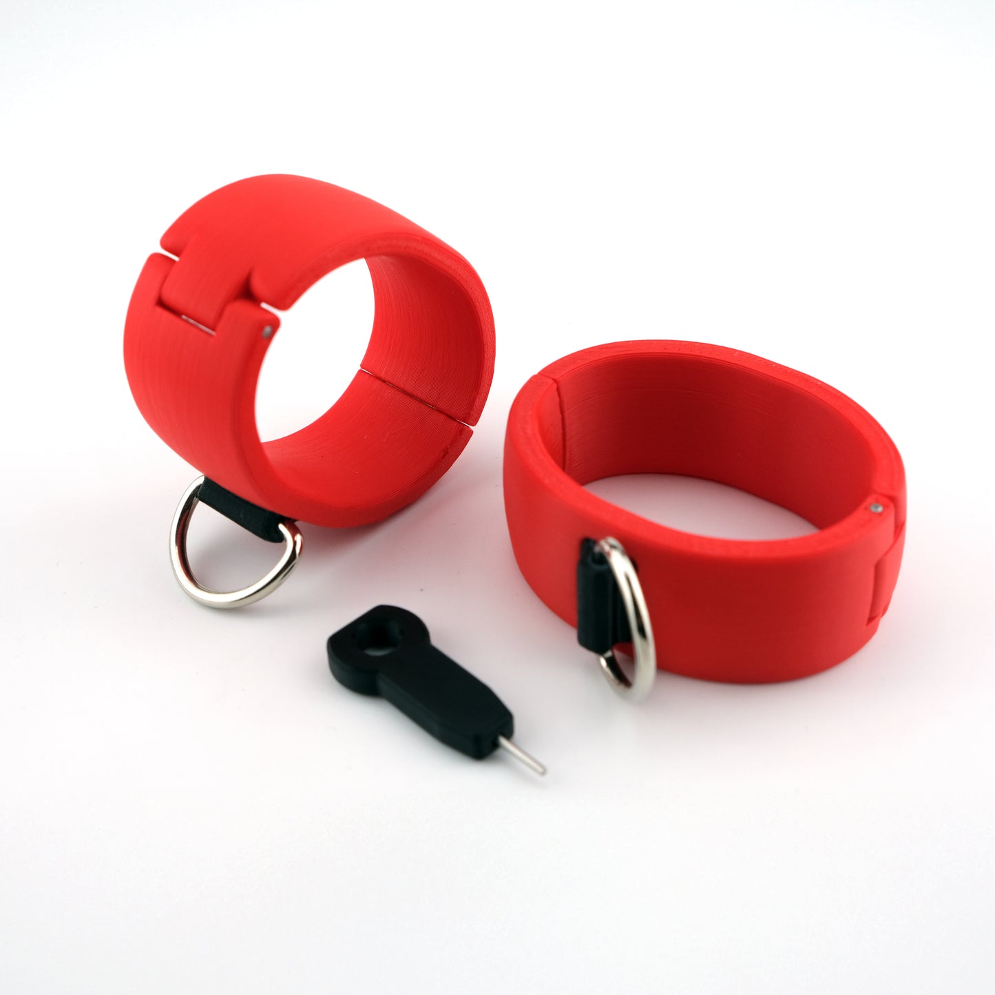 Quick Shackles - breite Handfesseln mit Schnappverschluss und D-Ring