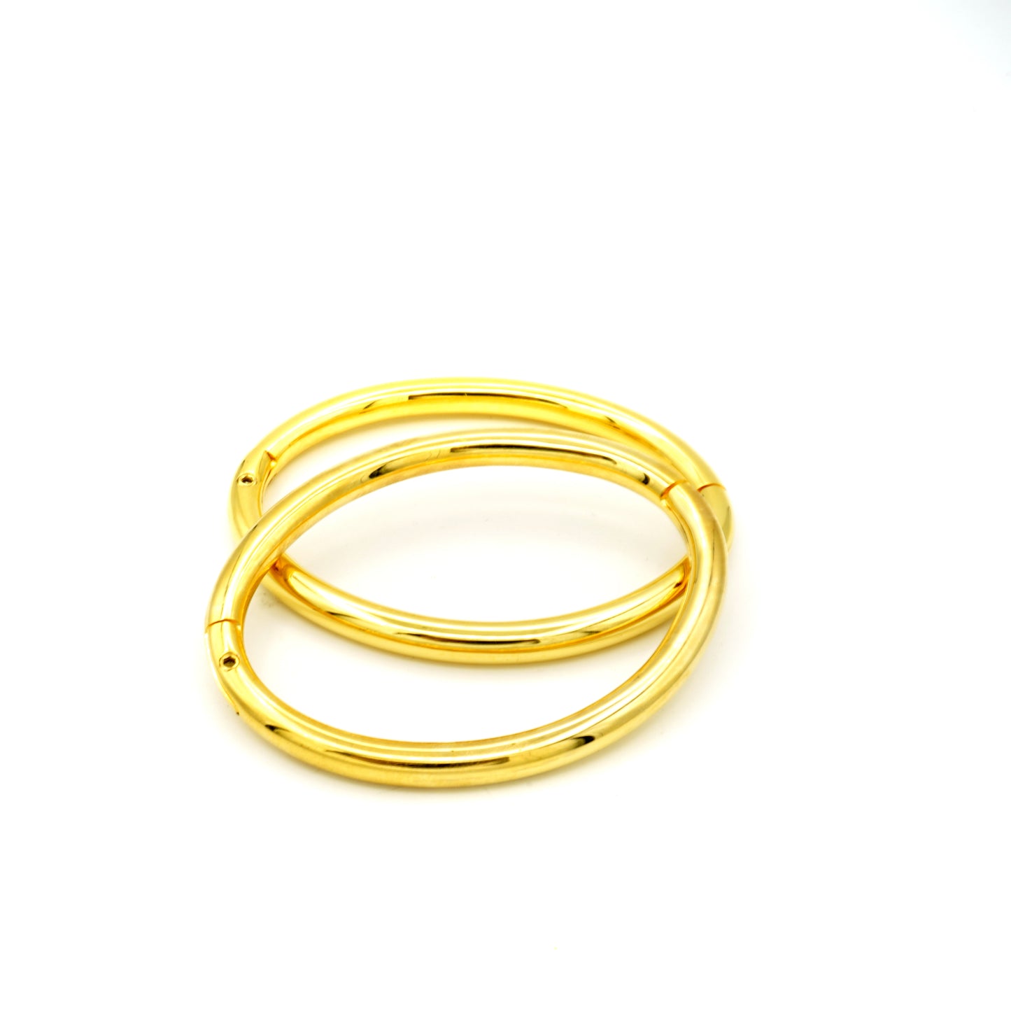 Thin locking jewelry bangles in black or polished gold with key
