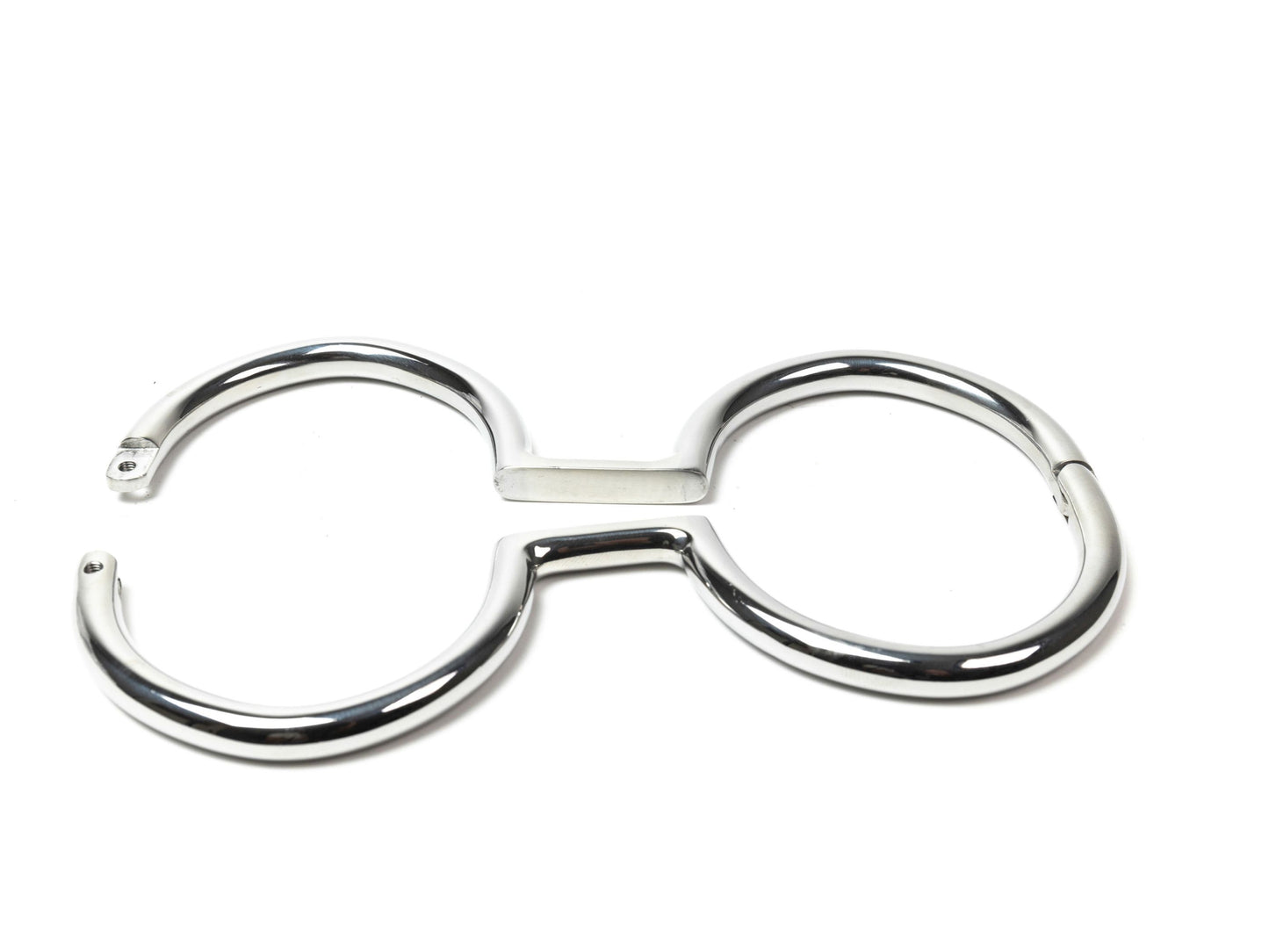 Rigid polished steel leg irons