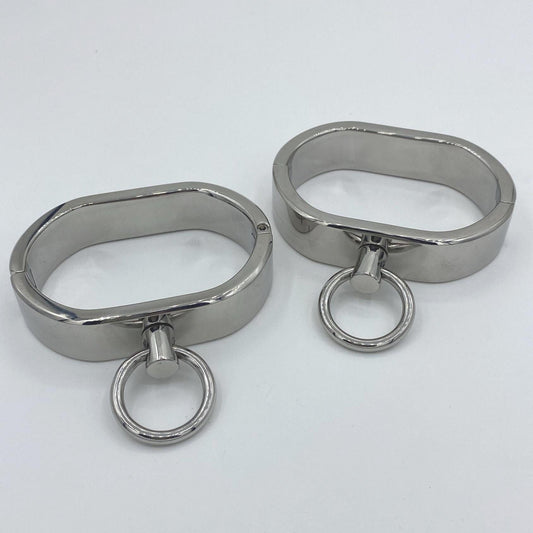 Wide stainless steel cuffs with rings Circumf.: 18cm
