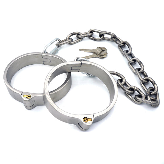 Heavy stainless steel leg irons with chain, lockable
